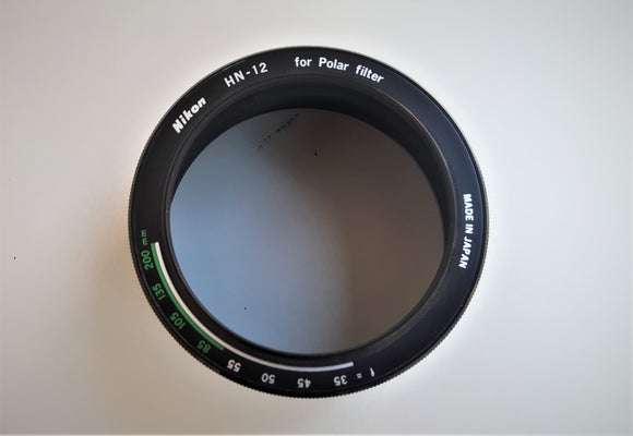 NIKON HN-12 PARALUCE NUOVO filettatura da 60mm X uso sul filtro Polarizzatore originale Nikon da 52mm prodotto negli stessi anni. 2 Sezioni : --1 x Focali da 35mm a 55mm - 1+2 x Focali da 85mm a 200mm