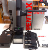 PENTAX AF400T Flash Torcia PENTAX TTL x Analogiche LX  Corredato di Staffa Alimentatore 6 stilo aa  STAFFA  Diffusore Wide AFW2 - Cavo -Alimentatore Esterno PowerPack x Pile Mezza Torcia A Ottimo stato  Imballo