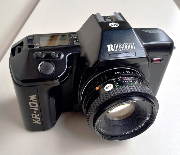 RICOH  KR-10M N.562 REFLEX ANALOGICA MANUAL FOCUS AUTO-MANUAL MOTORIZZATA KIT OB. STANDARD BUONO STATO